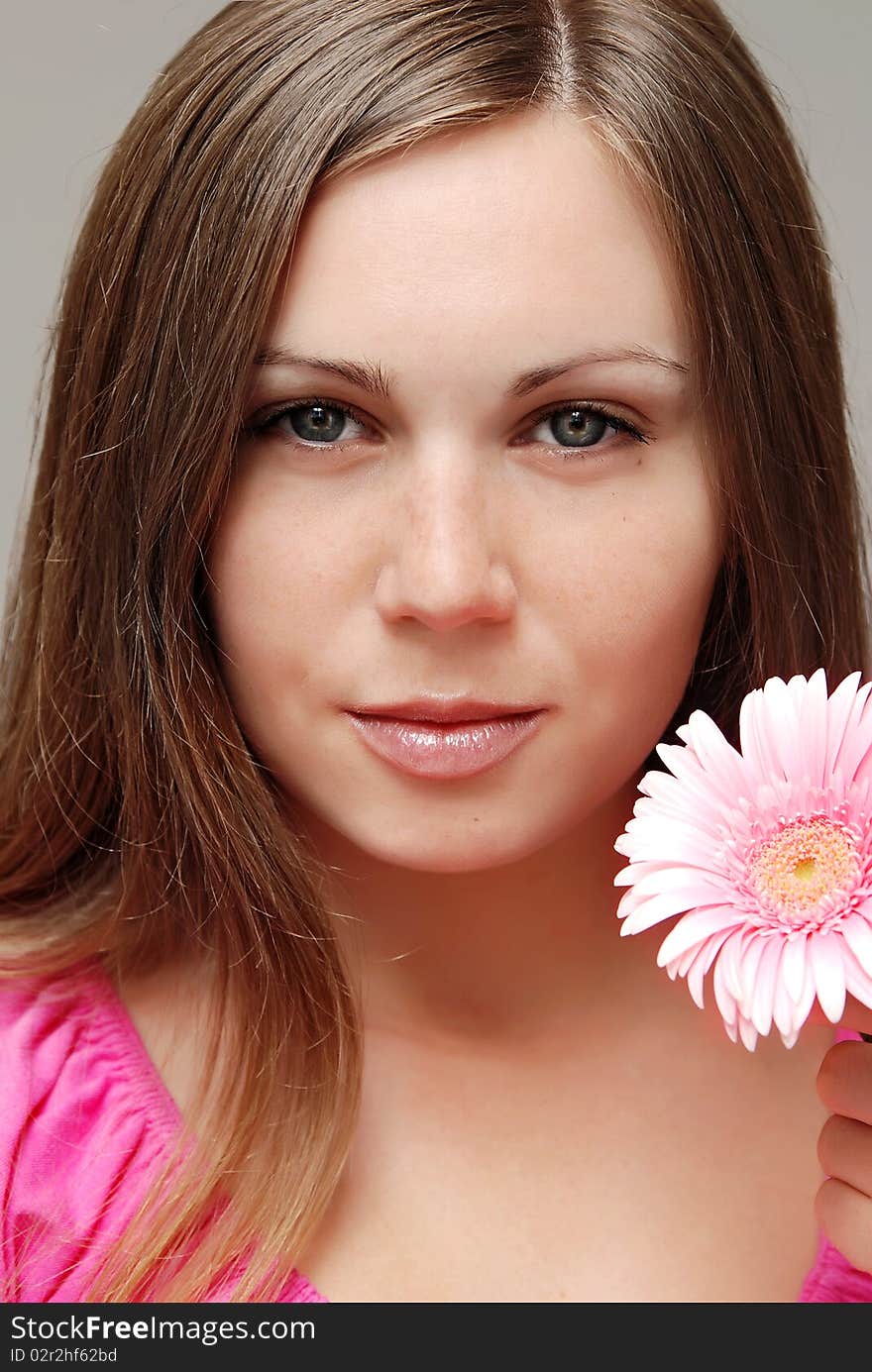 Young woman with flower