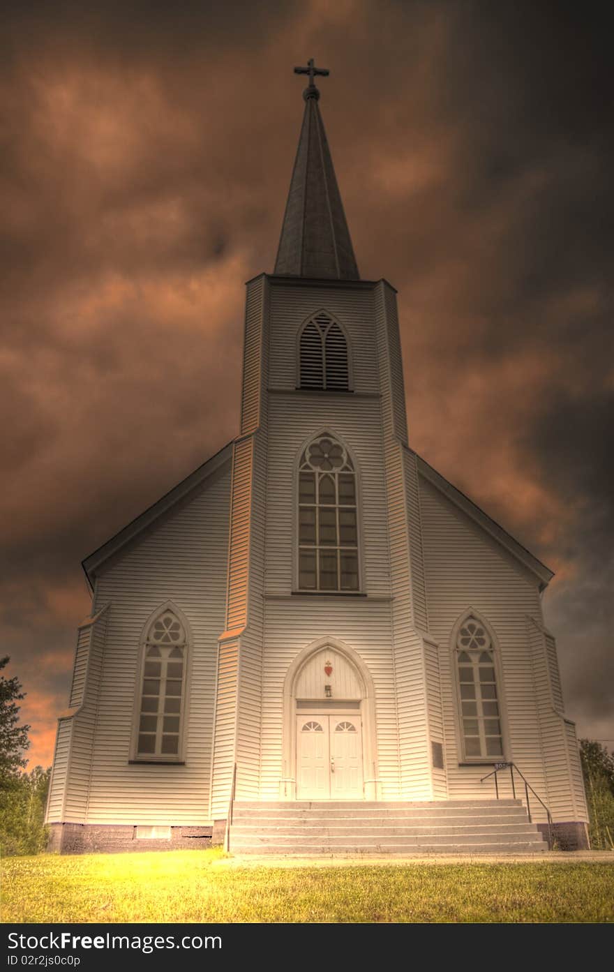 This is an HDR image of an old, wooden Roman Catholic church in a small villiage near Renous, in New Brunswick. This is an HDR image of an old, wooden Roman Catholic church in a small villiage near Renous, in New Brunswick.