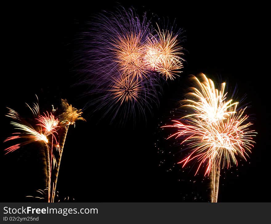 Bright bursting fireworks on black background. Bright bursting fireworks on black background