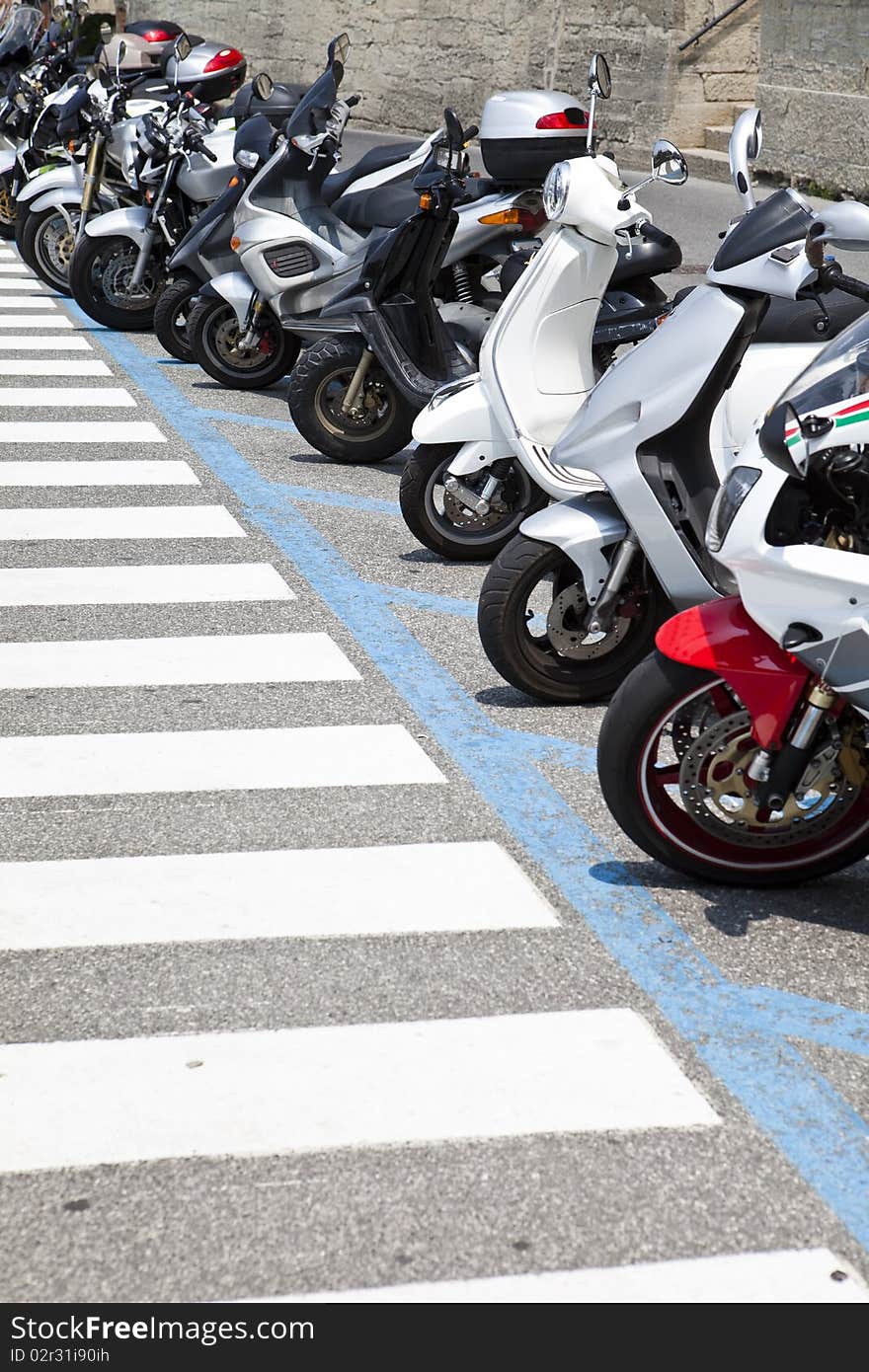 Parked motorcycles in a row