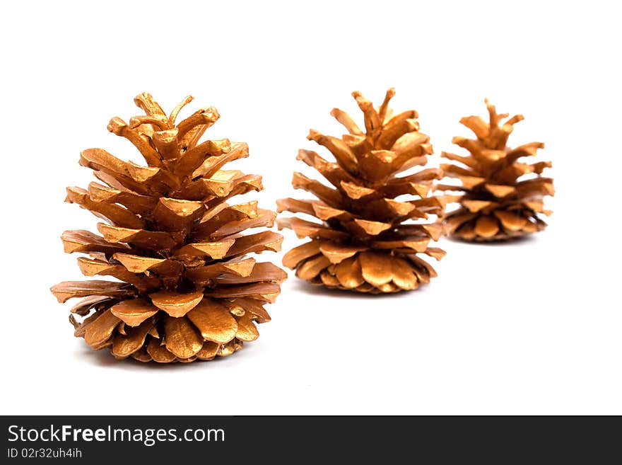 Gold cones on a white background