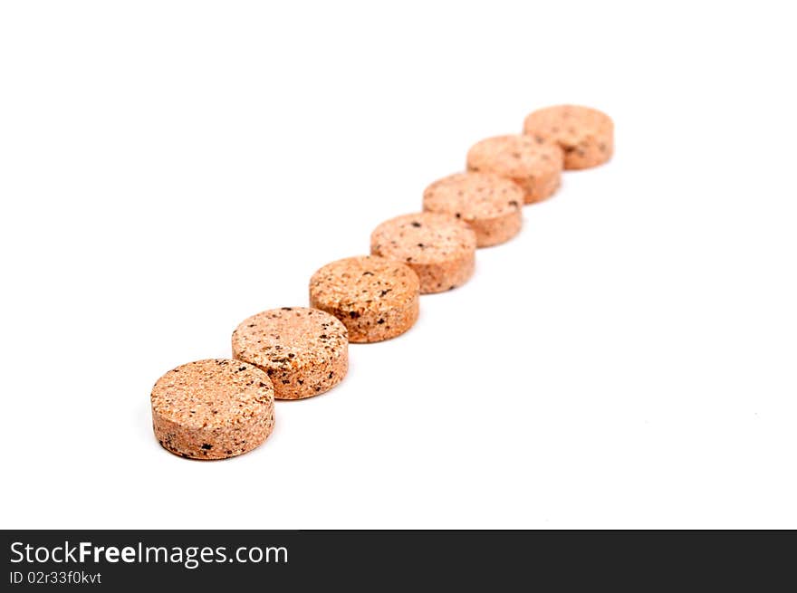 Vitamin tablets on a white background