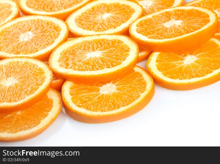 Orange slices on white background with space for text