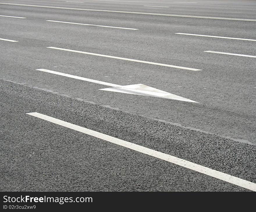 Arrow marks on a road. Arrow marks on a road