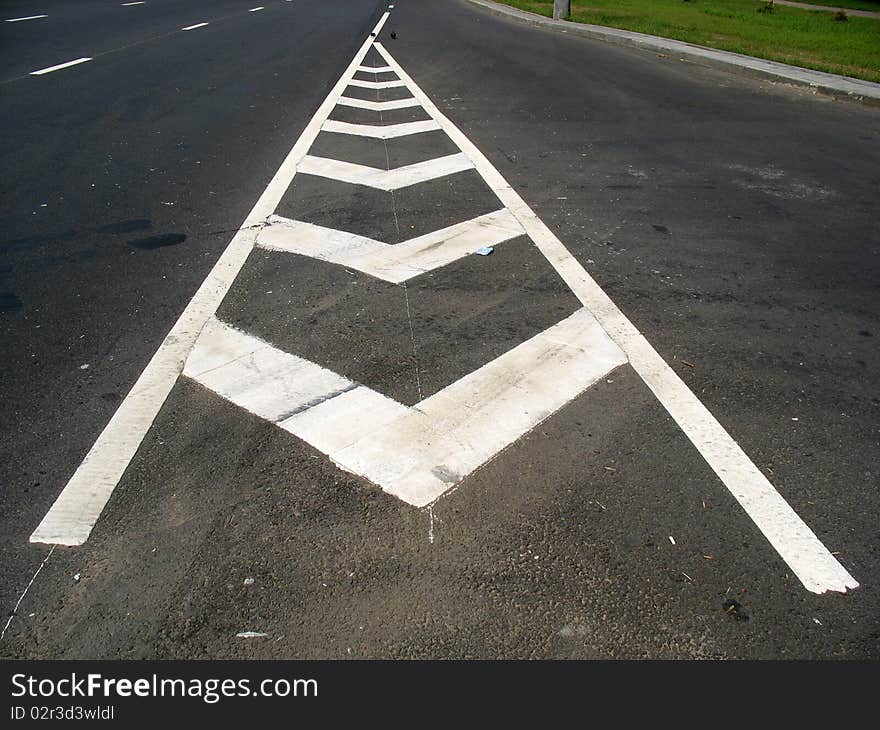 Road marking on the asphalted parking place