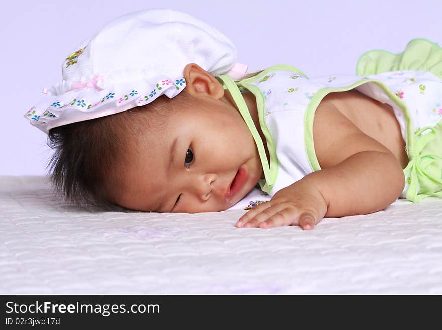 Cute asia baby will sleep.she is six month.