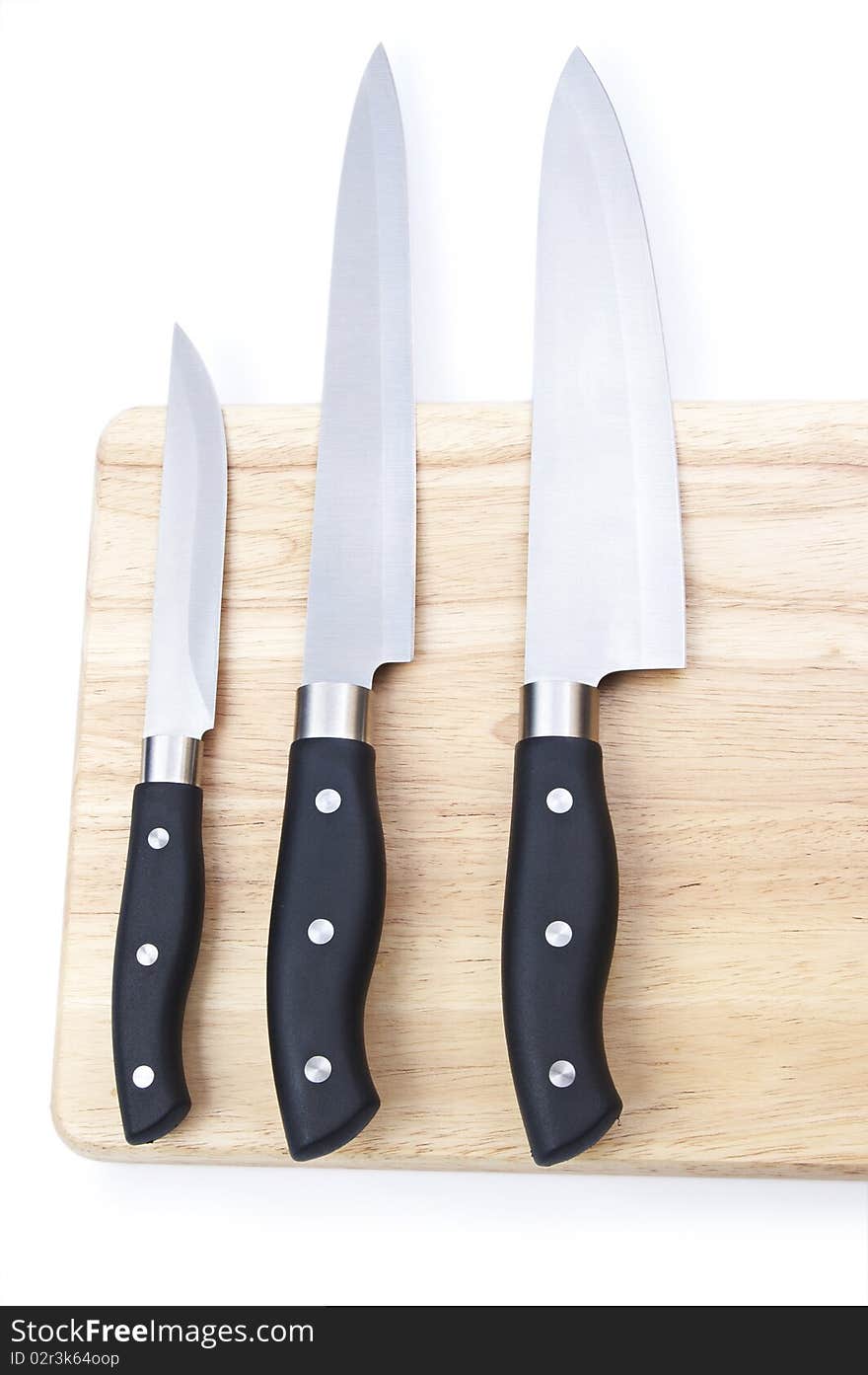 Cutting board with a knife isolated on a white background