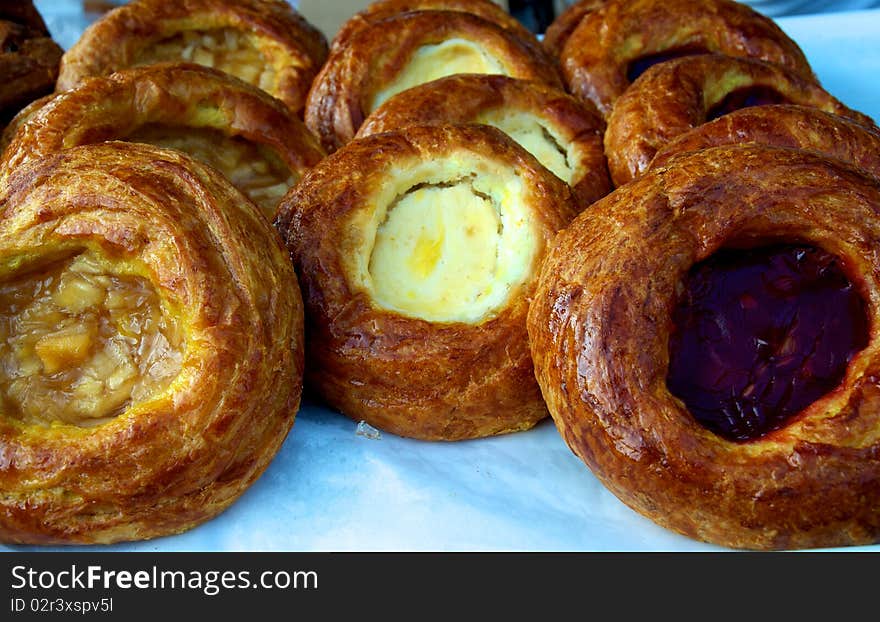 Horizontal close-up photo of fresh baked Danish pastries