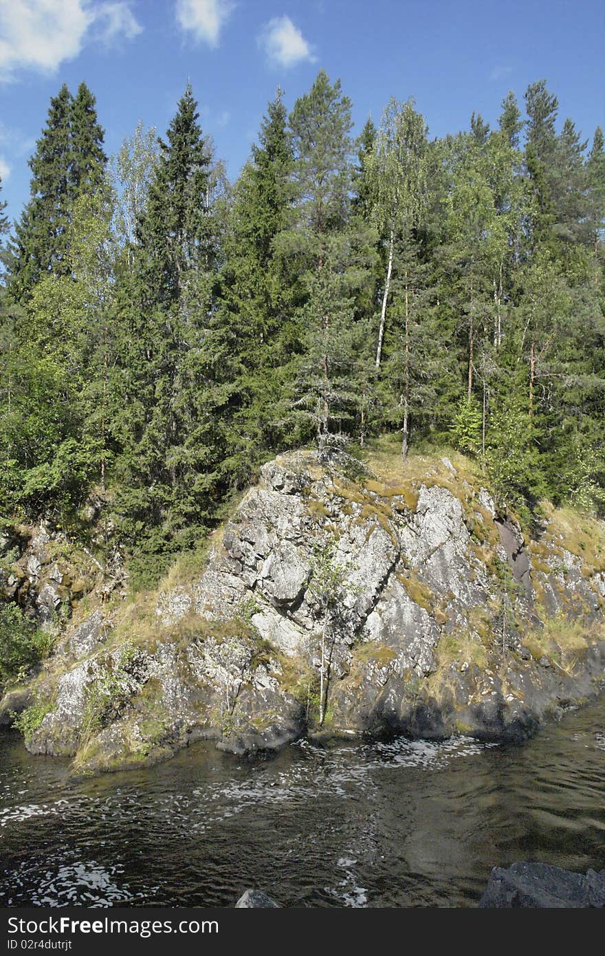 Rocky river bank Kivach, Kareliya, Russia. Rocky river bank Kivach, Kareliya, Russia