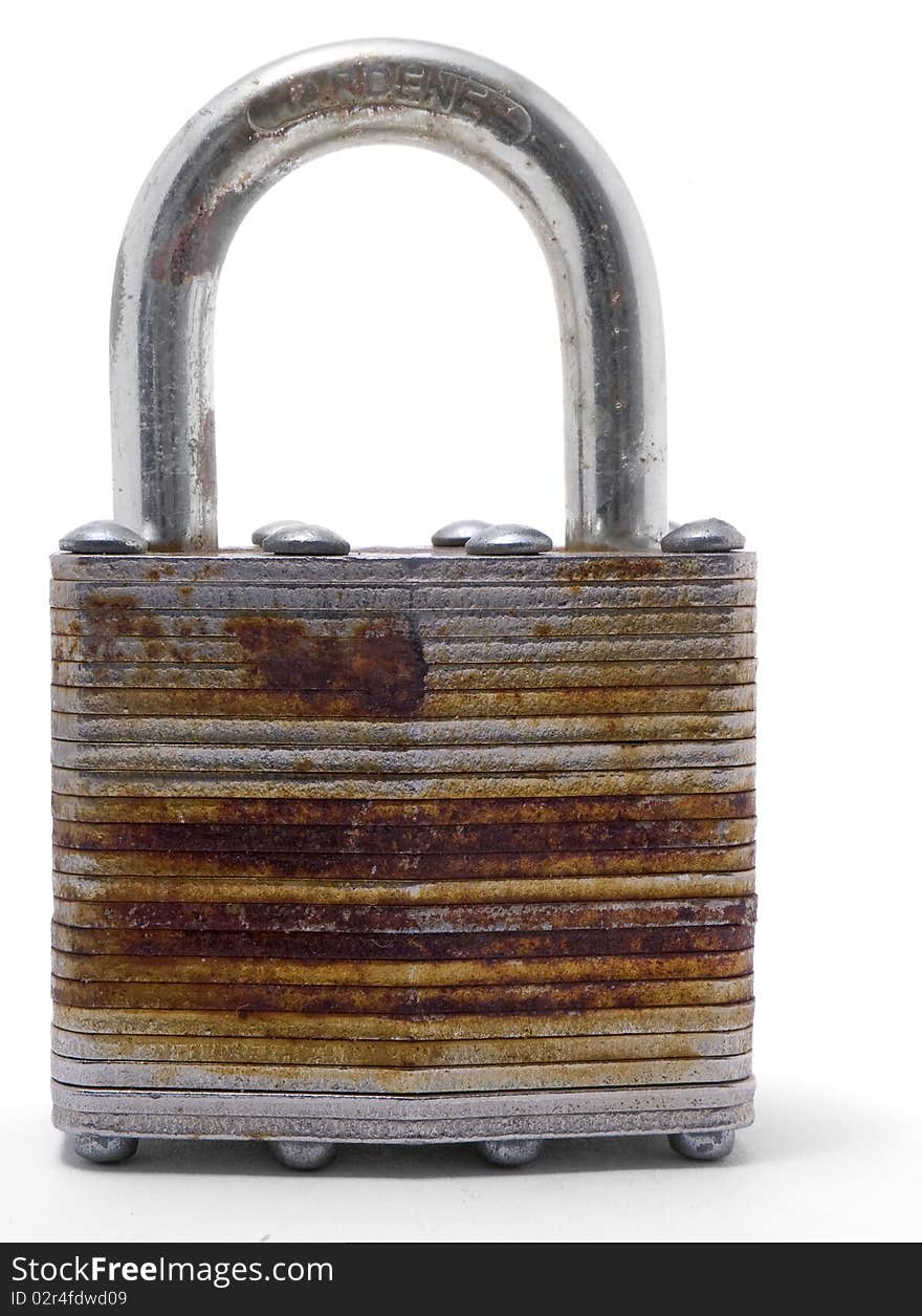 An old metal padlock on a white background