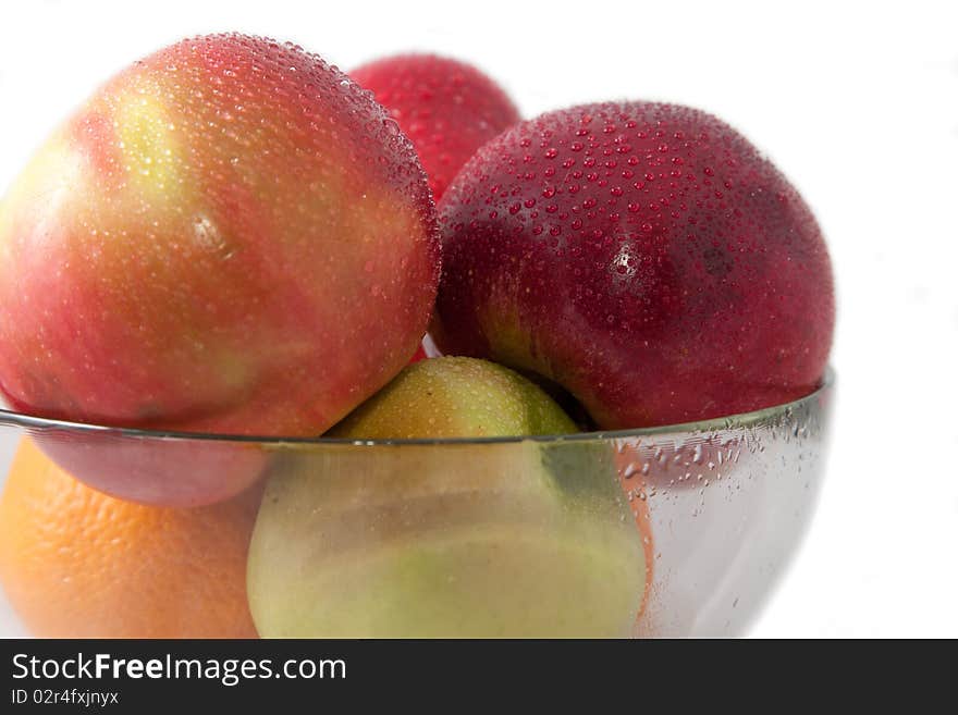 Apples in a glass vase. Isolated, white background