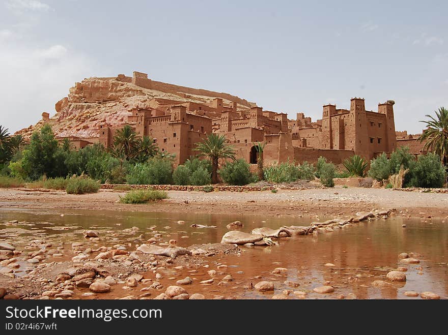 Stones placed across the river provide an access to Ait Benhaddou. Stones placed across the river provide an access to Ait Benhaddou