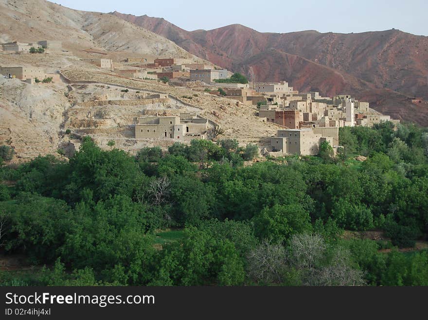 A small berber village clings to the slopes of the atlas mountains