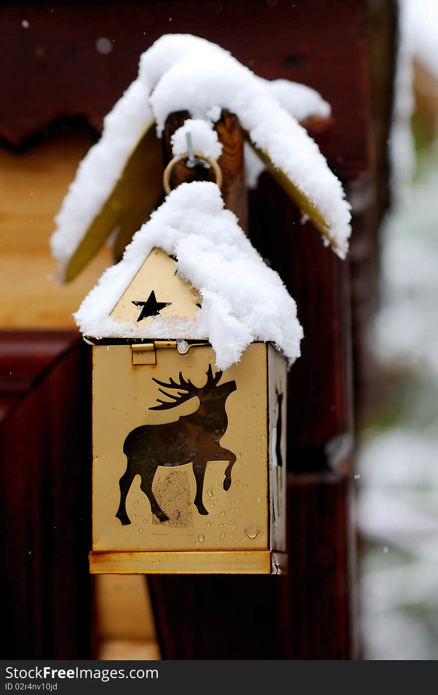 Golden Christmas lantern with deer and stars