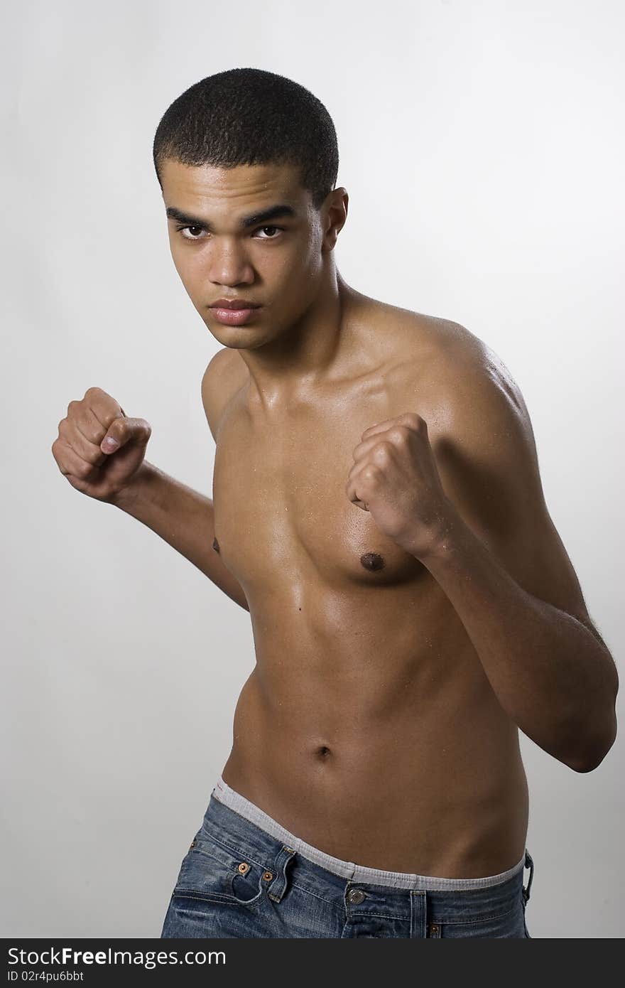 Young handsome african-american fighter. Young handsome african-american fighter