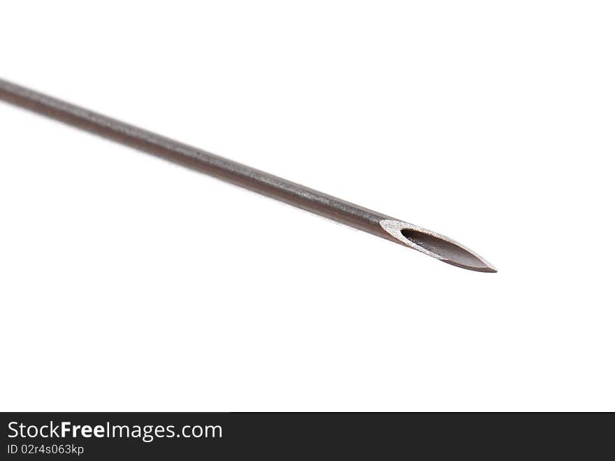 Macro photo of a syringe needle isolated