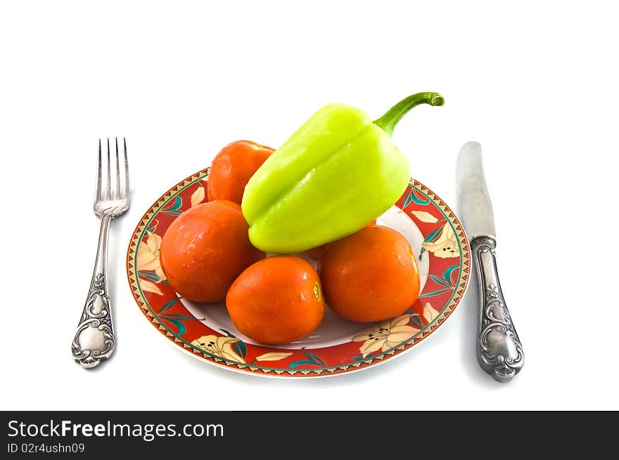 Peppers and tomatoes on plate on white bacground. This is raster image.