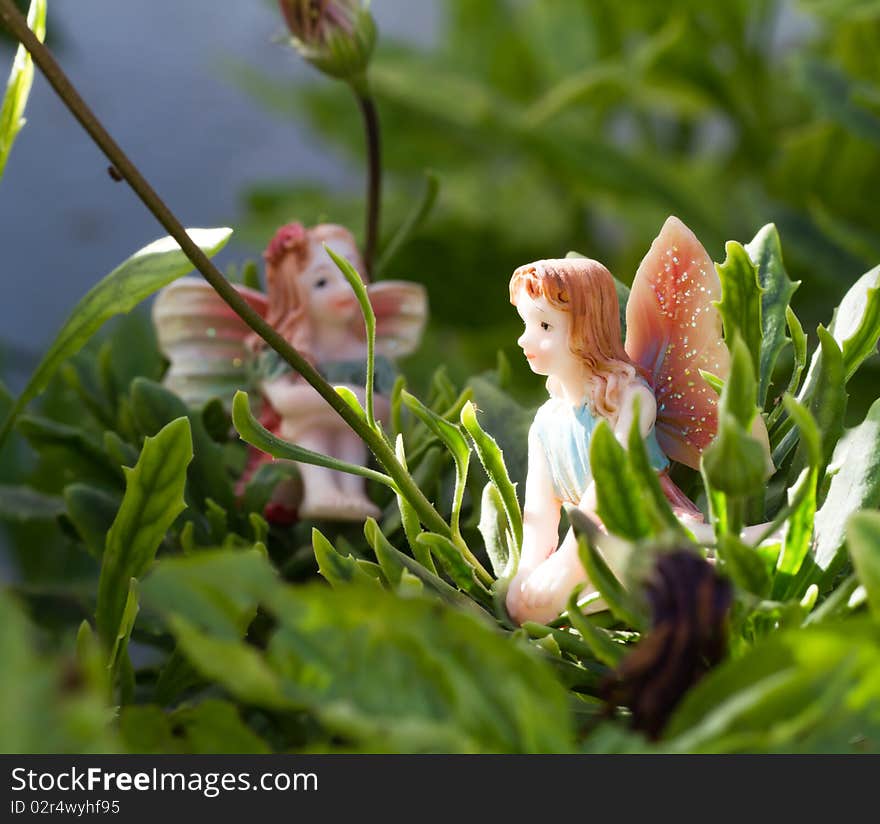 Generic dolls shaped fairy on vegetation. Generic dolls shaped fairy on vegetation