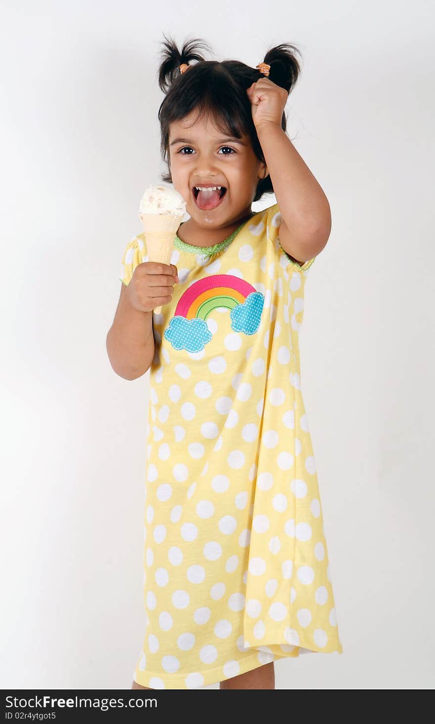 Sweet and cute toddler eating and enjoying ice cream. Sweet and cute toddler eating and enjoying ice cream