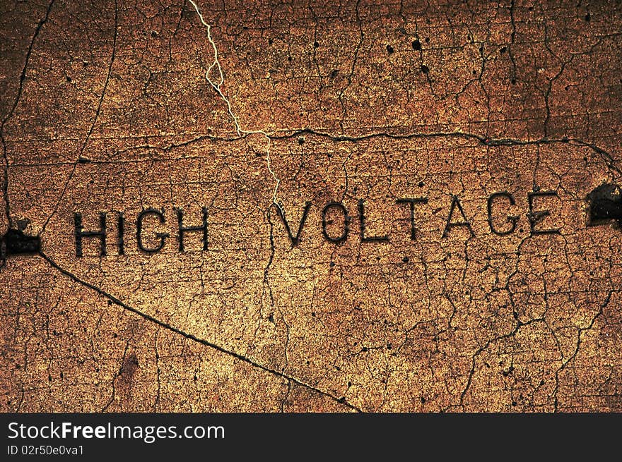 Image of High Voltage carved in cement with voltage running through. Image of High Voltage carved in cement with voltage running through