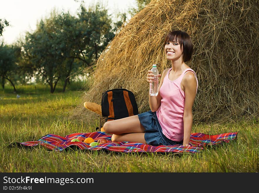 Lovely girl having a rest on picnic. Lovely girl having a rest on picnic