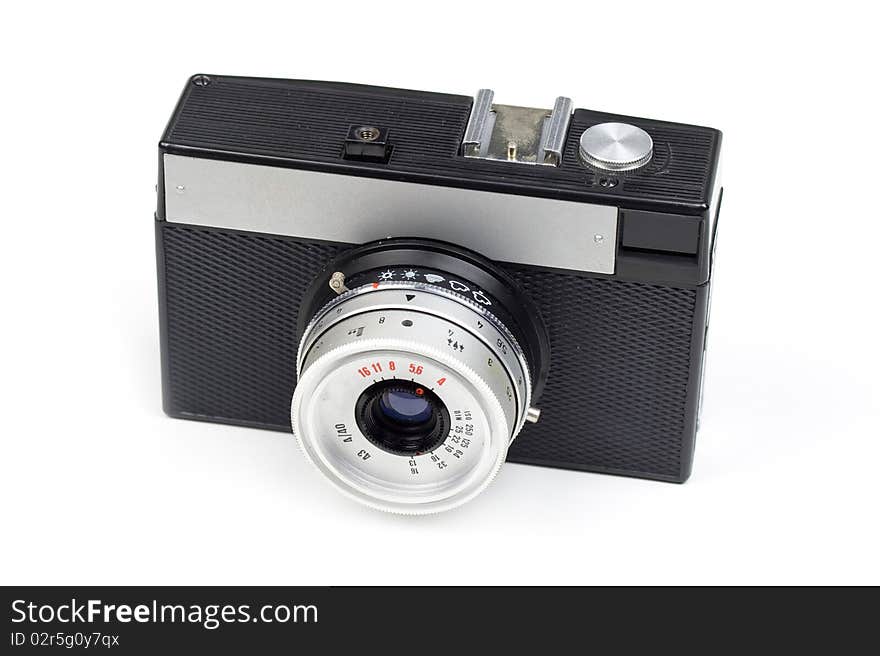 Old 35mm film camera isolated on white