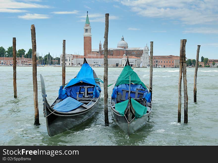 Two gondolas on the San Marco canal and Church of San Giorgio Maggiore in Venice, Italia. Two gondolas on the San Marco canal and Church of San Giorgio Maggiore in Venice, Italia.