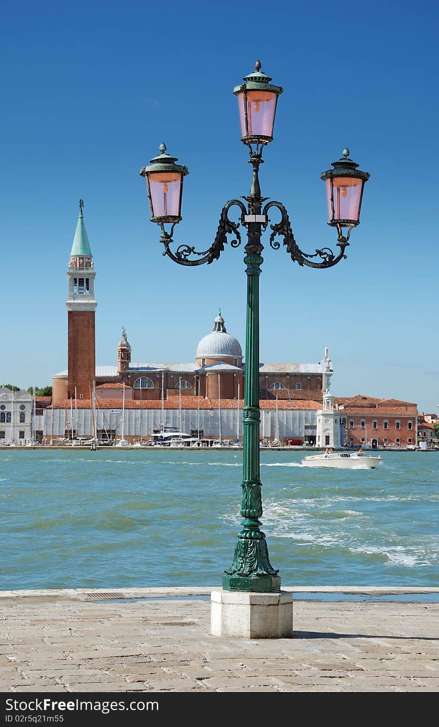 Lamppost on the quay Riva degli Schiavoni and Church of San Giorgio Maggiore in Venice, Italia. Lamppost on the quay Riva degli Schiavoni and Church of San Giorgio Maggiore in Venice, Italia.