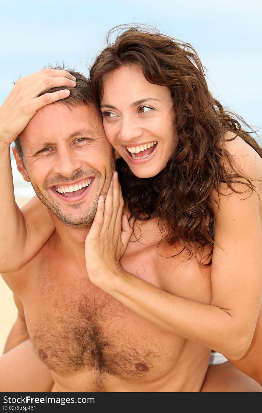 Couple having fun at the beach. Couple having fun at the beach