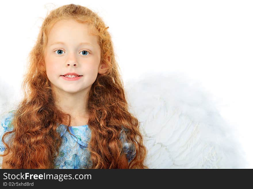 Portrait of a cute red-haired girl angel. Isolated over white background. Portrait of a cute red-haired girl angel. Isolated over white background.