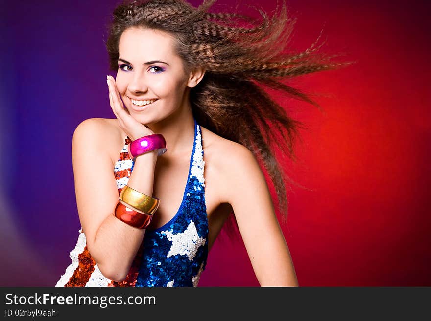 American woman in colored background