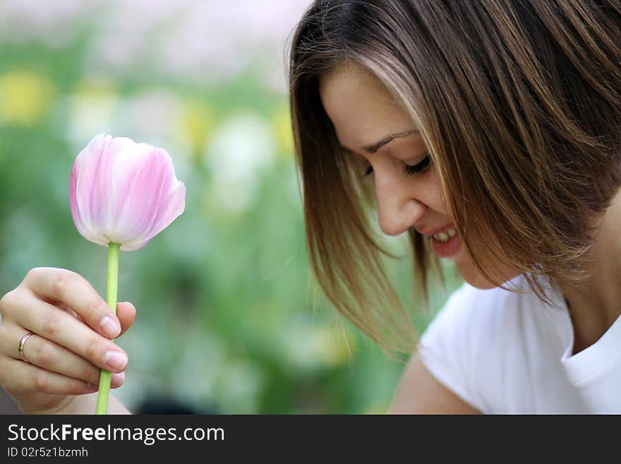 Beautiful Girl With Tulip Flowers