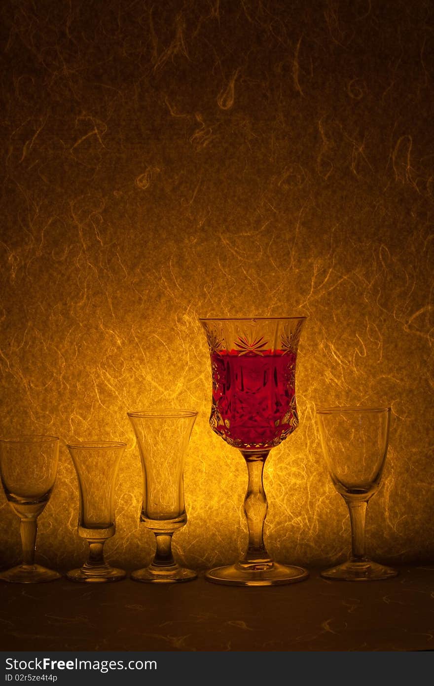 Red wine on yellow background