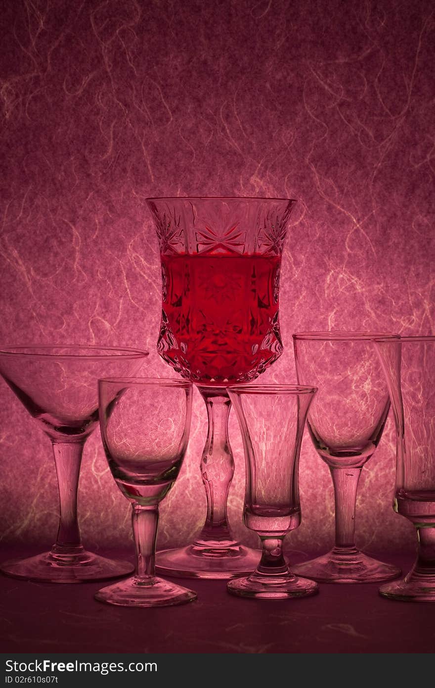 Red wine on purple background