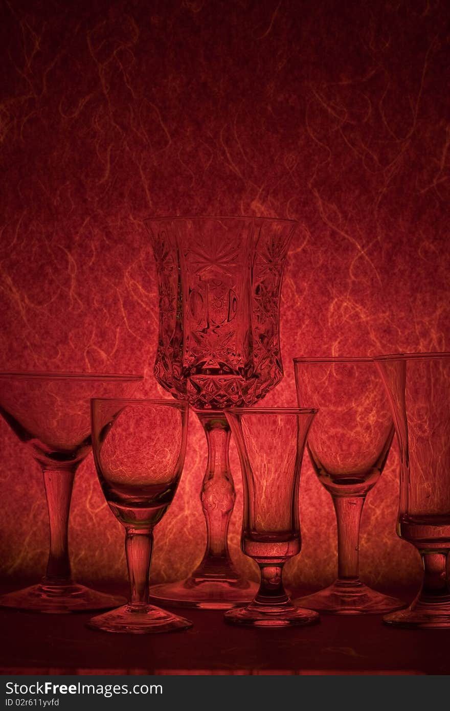 Many glass on red background