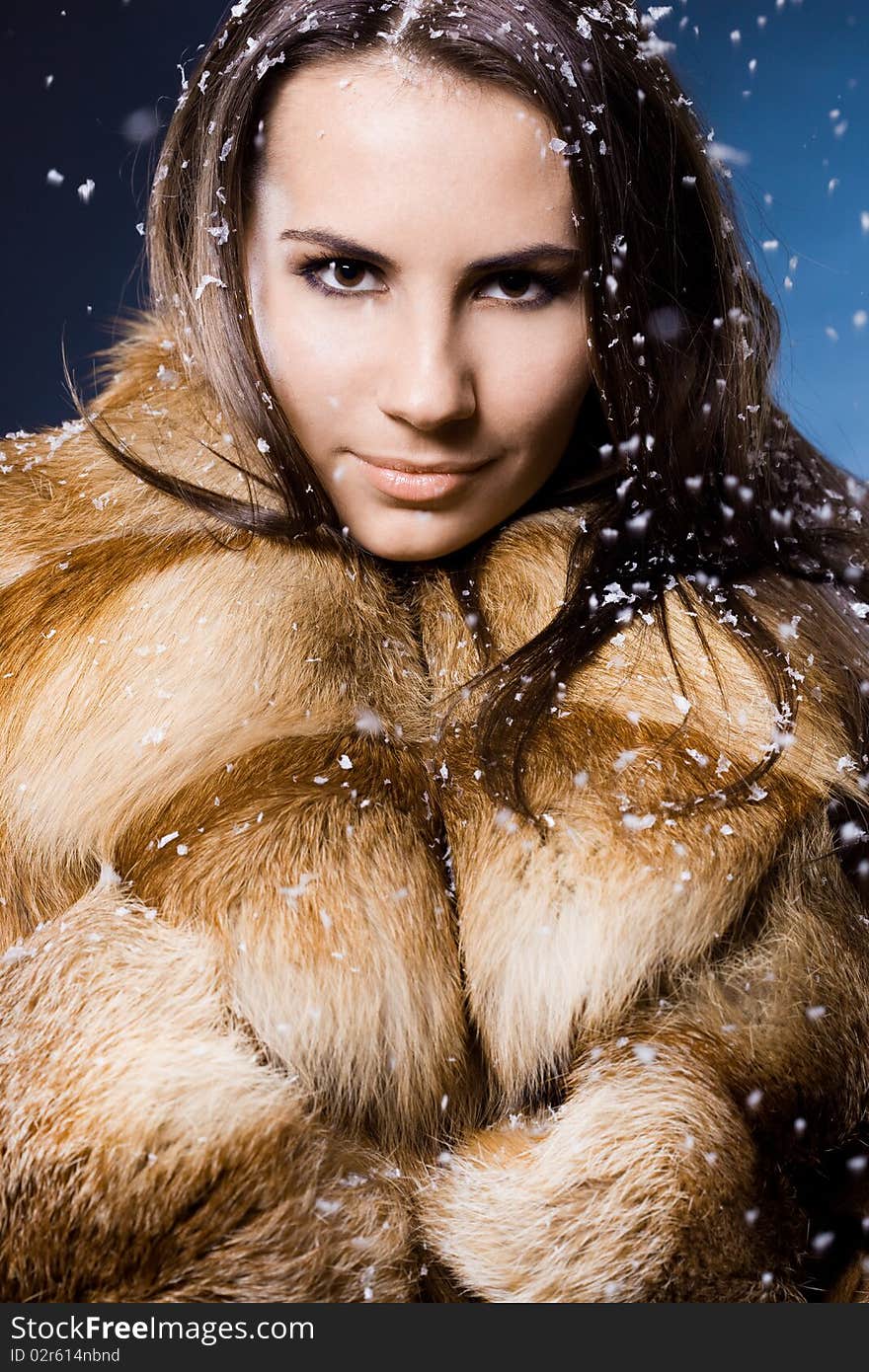 Beautiful woman in a fur coat