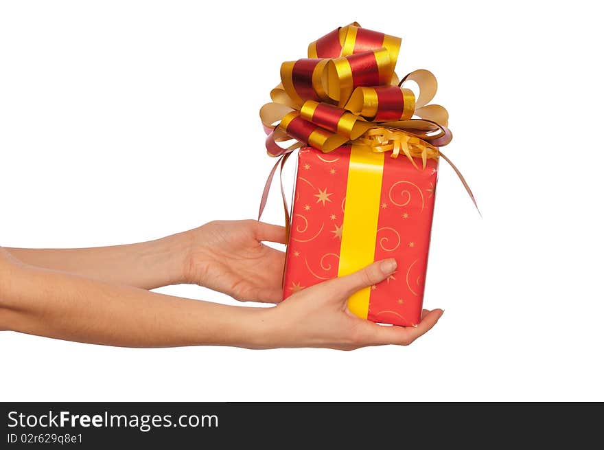 Woman giving a red box with yellow bow as a gift. Woman giving a red box with yellow bow as a gift