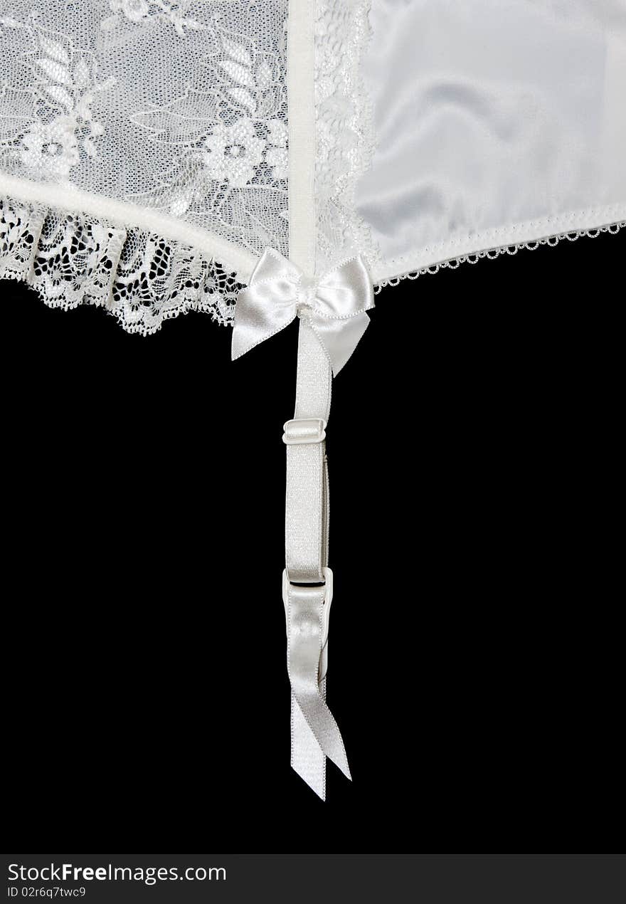 White lace on white background with garter