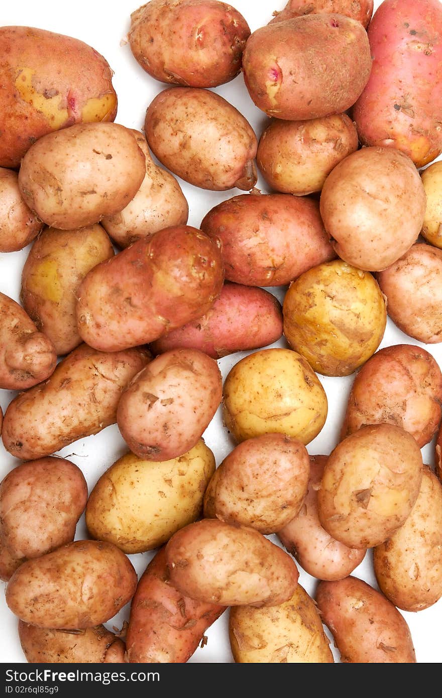 Potatoes is spilt by background on white