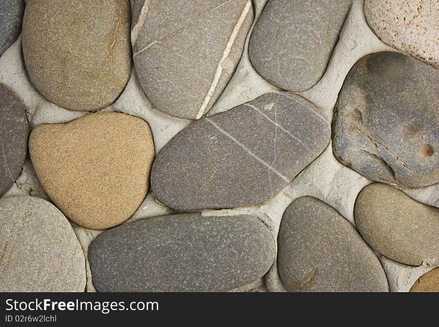 Close-up of wall made of sea stones. Close-up of wall made of sea stones