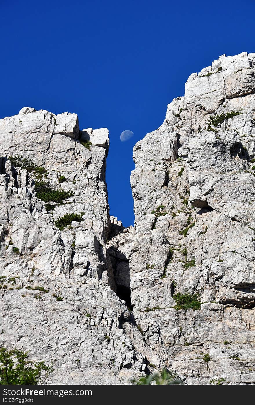 Moon Between Rocks