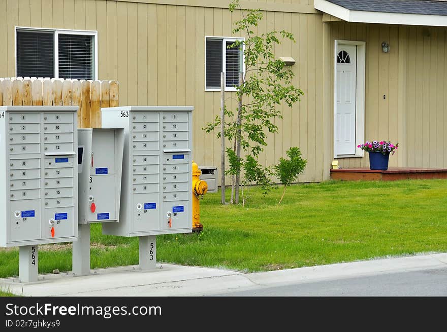 Letterboxes in front of house