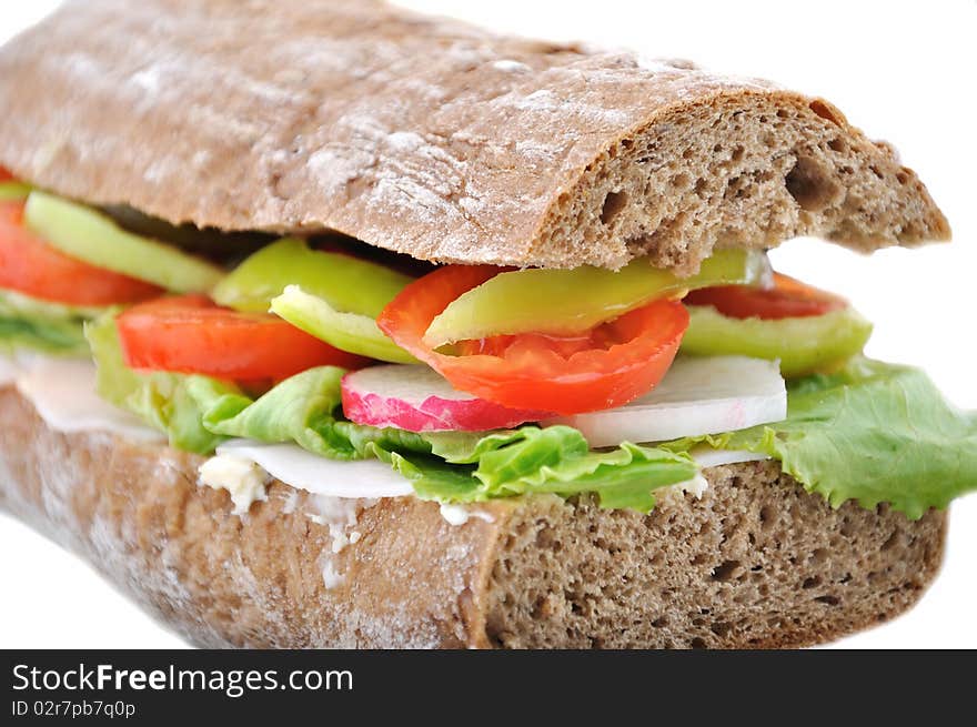 Diet brown baguette with vegetable, isolated on white background