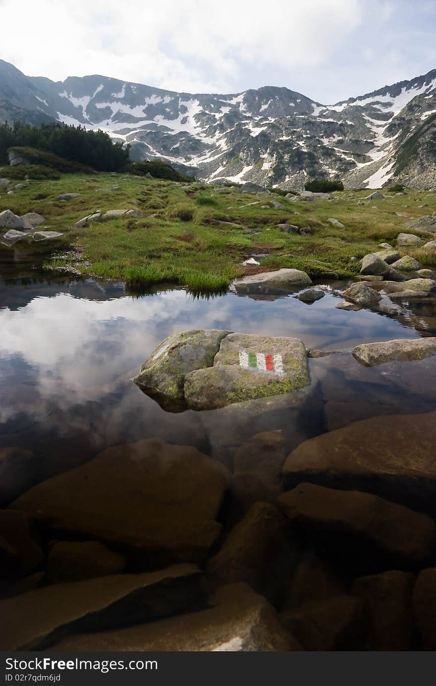 Sky reflecting in water pond - Bulgarian Balkans