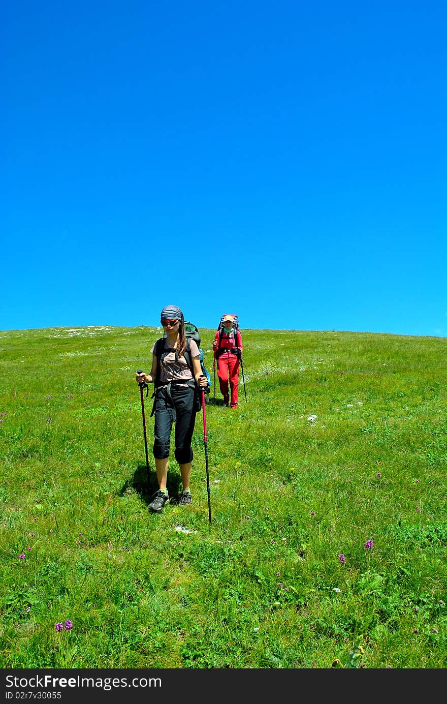 Girls hiking in mountains