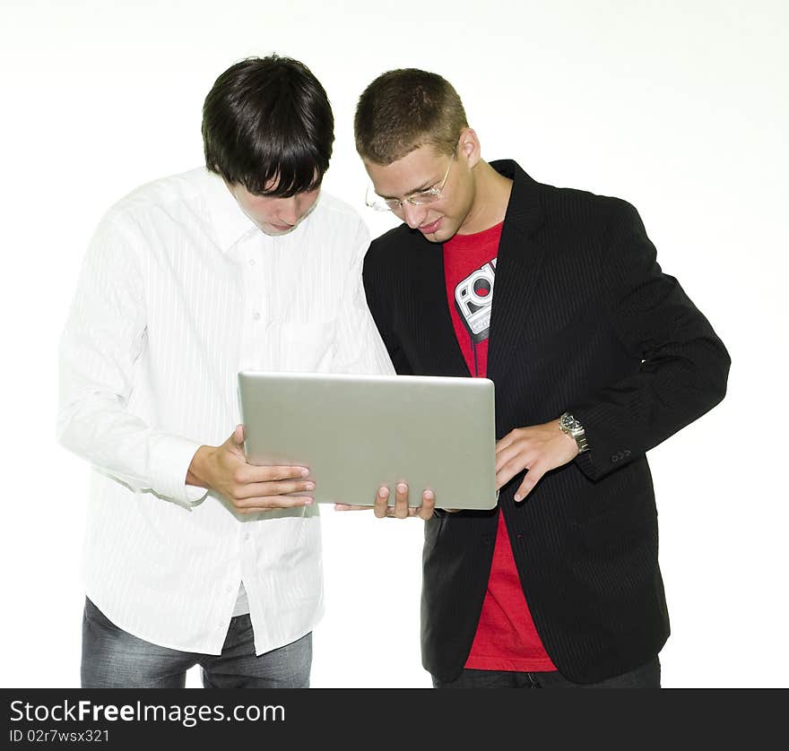 Two businessmen looking at laptop