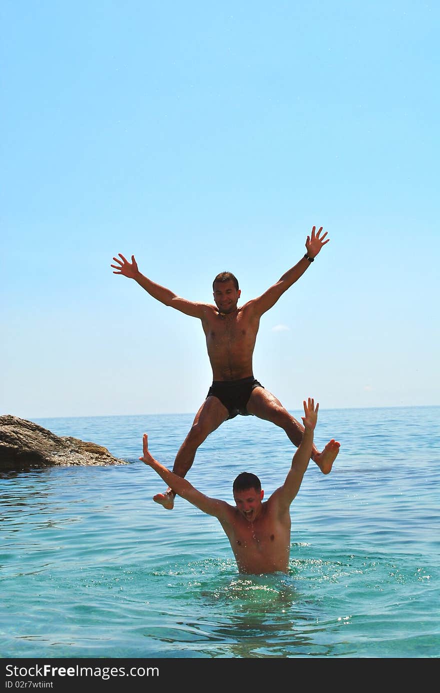 Portrait of a happy active man jumping in the air. Portrait of a happy active man jumping in the air