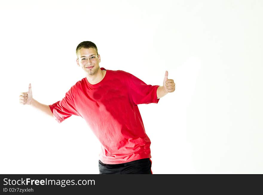 Young, happy, natural, cheerful man with thumbs up, isolated on white background