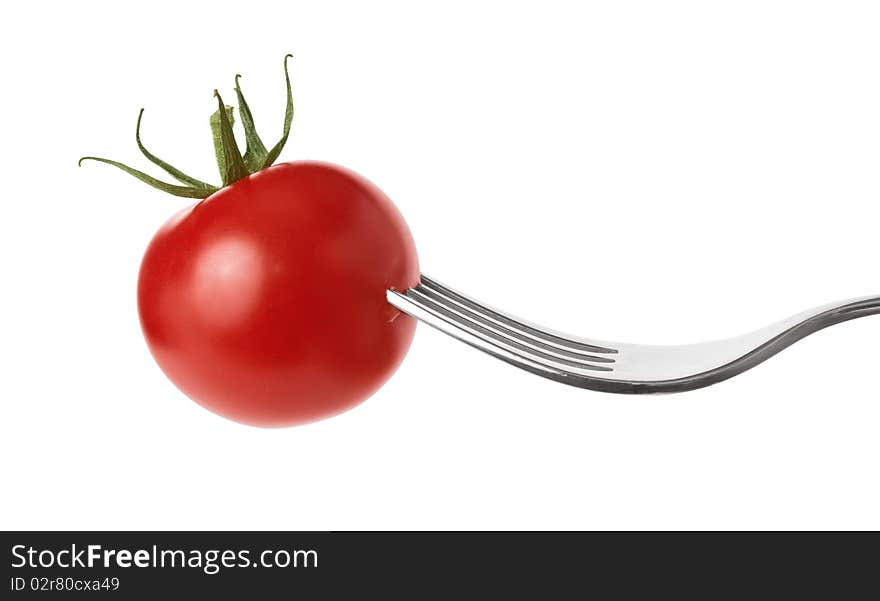 Fresh diet vegetable tomato snack on fork