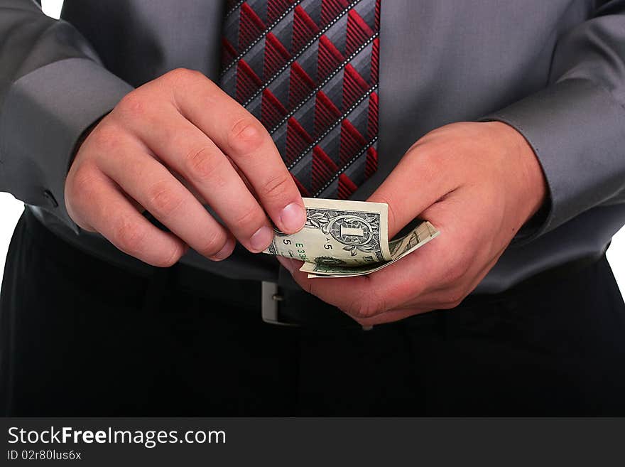 The businessman in a grey shirt and a tie has control over money. The businessman in a grey shirt and a tie has control over money.